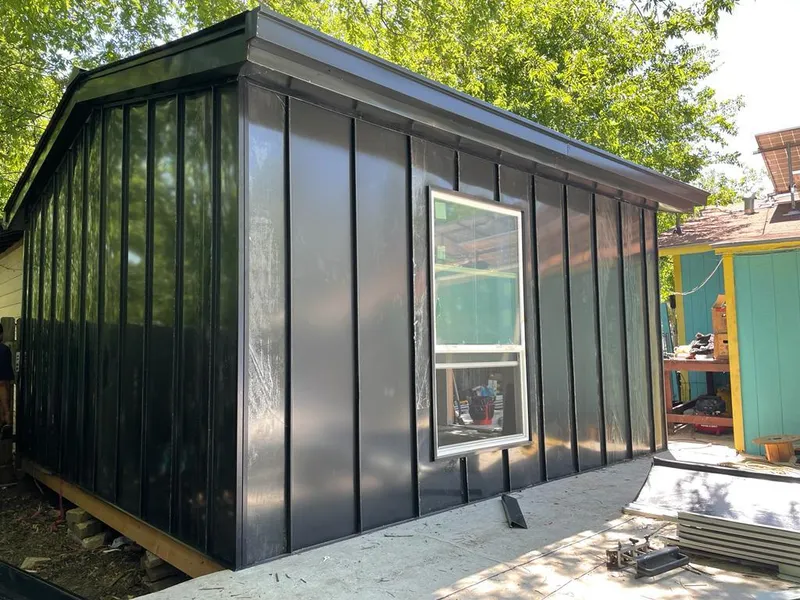 Black standing seam metal wall panels for Roof Inspection in West Hollywood